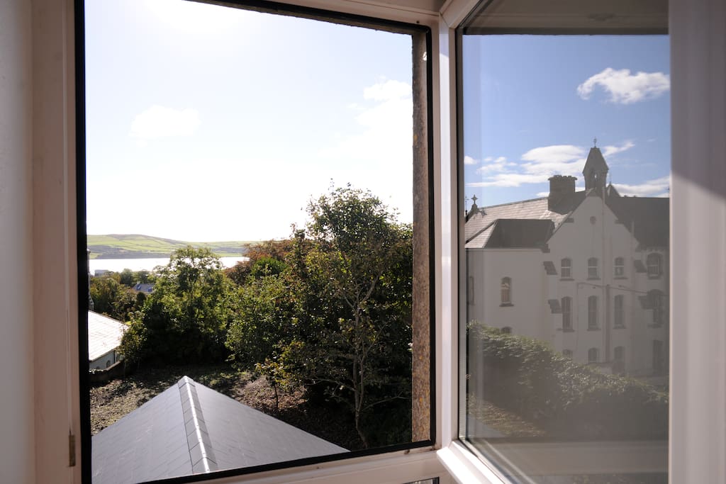 Wake up to the view of Dingle Harbour - from your bed..