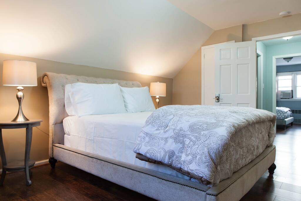 Relaxing Upholstered Queen Size Bed Awaits You!