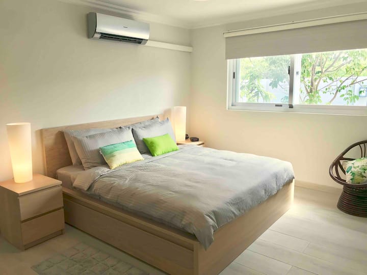 Bedroom 4 - Relax in our serene master bedroom with king size bed . 