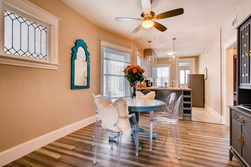 Ghost chairs highlight robin's egg blue table
