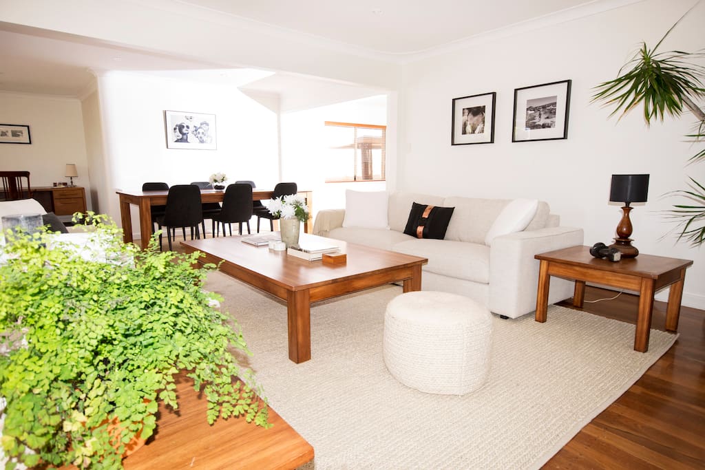 The open plan lounge and dining is a perfect place to relax after a day at the beach.