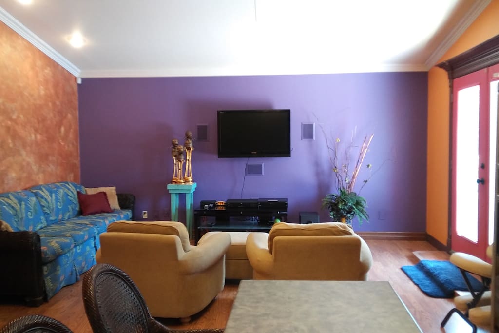 This is the TV room. You can listen to your shows or music from this room as well as outside on the terrace or in your beautiful bathroom. Dish and Netflix are included.