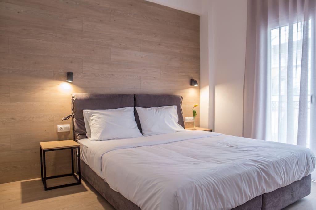 Spacious bedroom with queen size bed, big closet, a/c, blinds and safe. You can even access the balcony from the bedroom