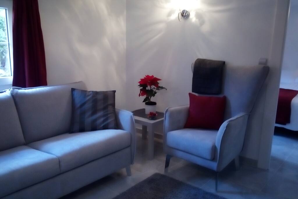 Lounge..with TV. Sofa converts into double bed