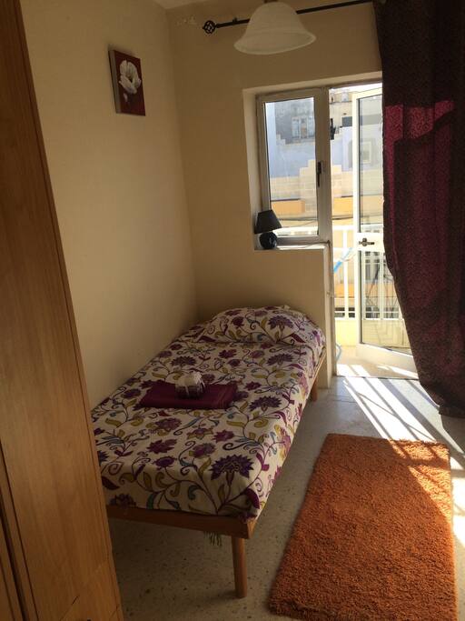 Single bedroom with balcony