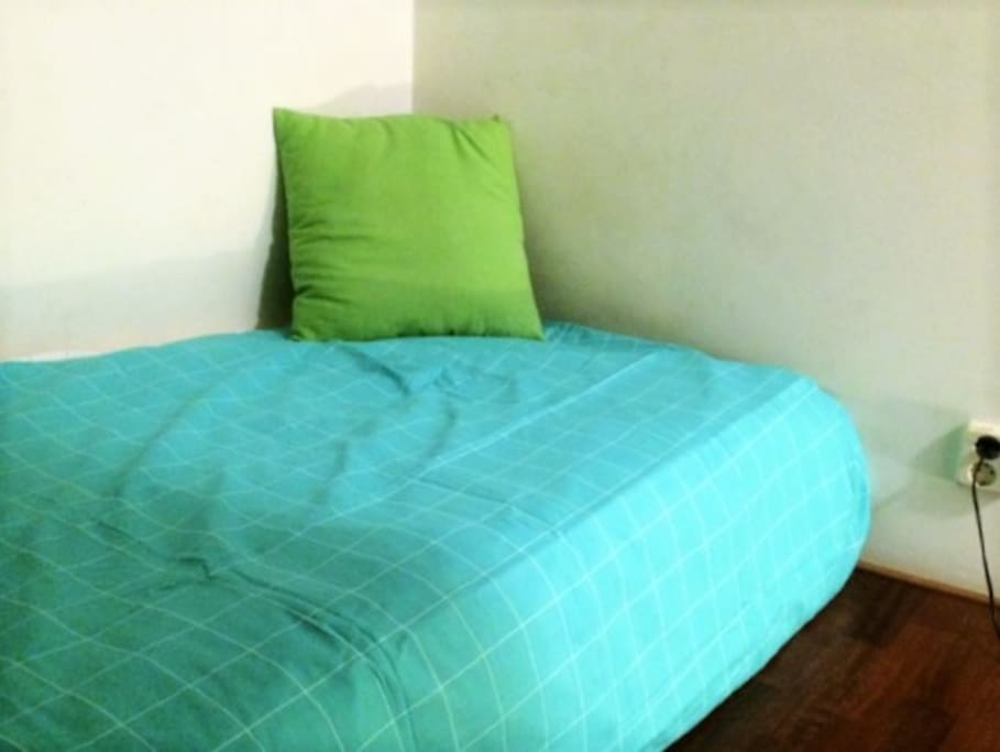 The bed is low but still a real bed (mattress not right on the floor)