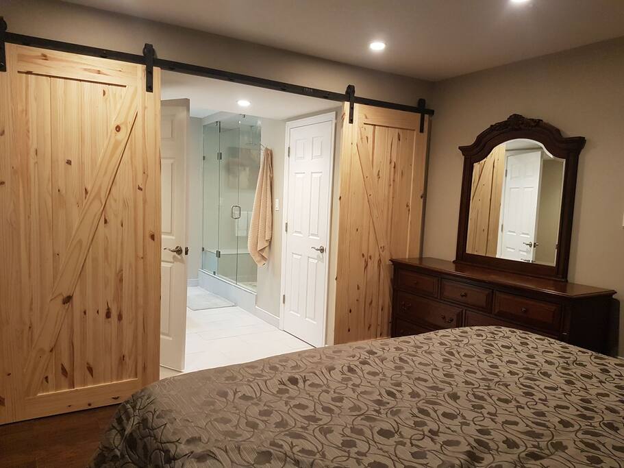 barn door entry to master bath