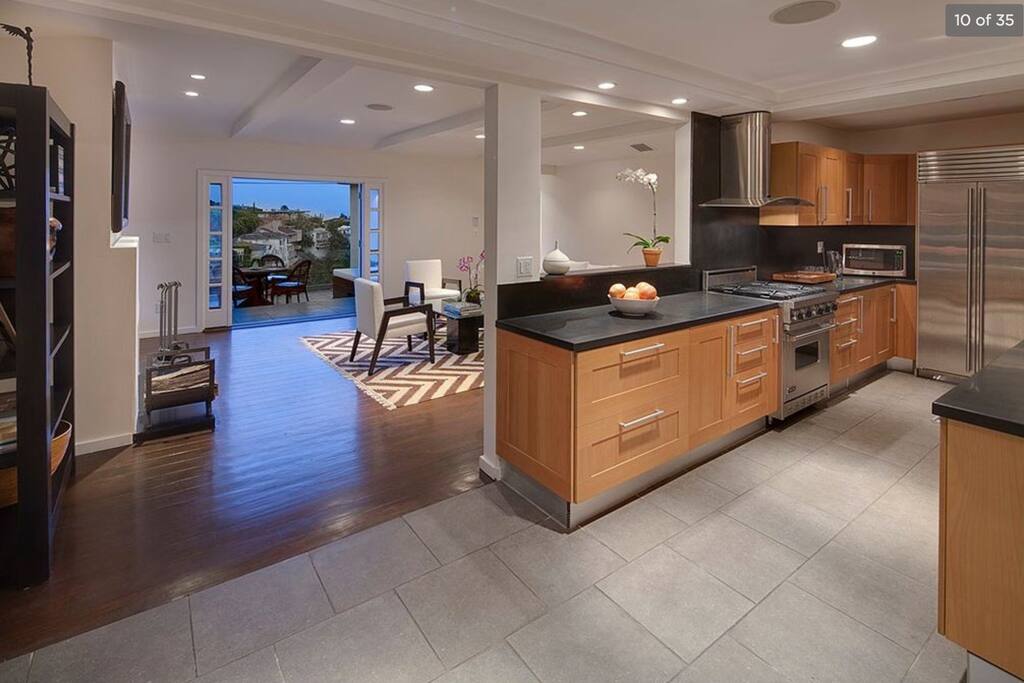 A true masterpiece kitchen with views of Hollywood from the counter top through the living room and the 2nd story patio