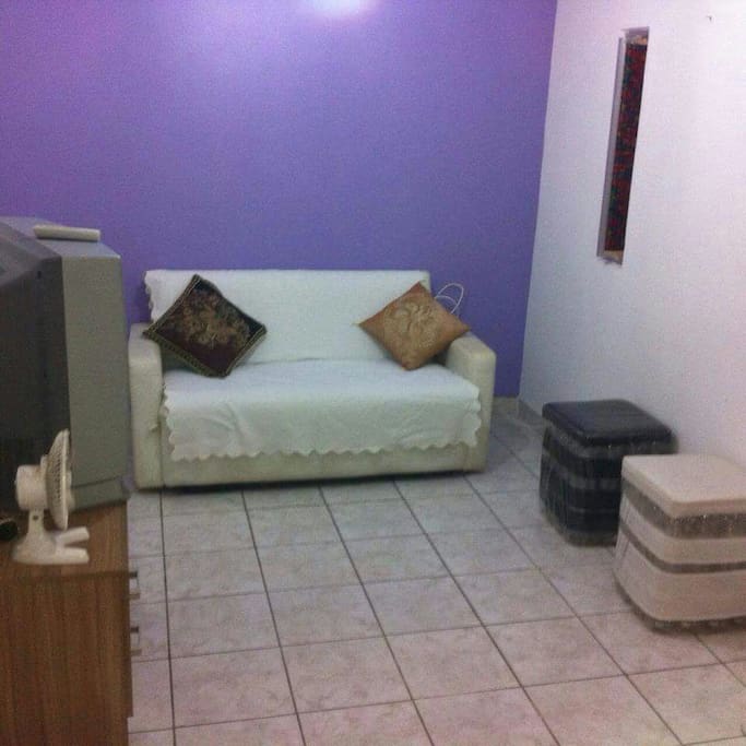 Sala com sofá-cama
