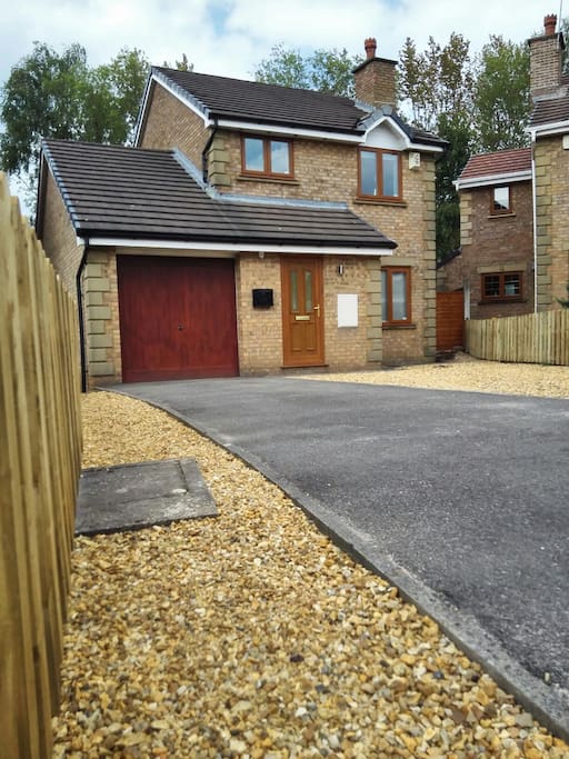 Frontage, gravel area for extra parking.