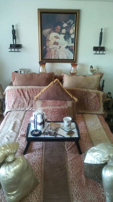 Queen Bed with firm mattress; breakfast tray.