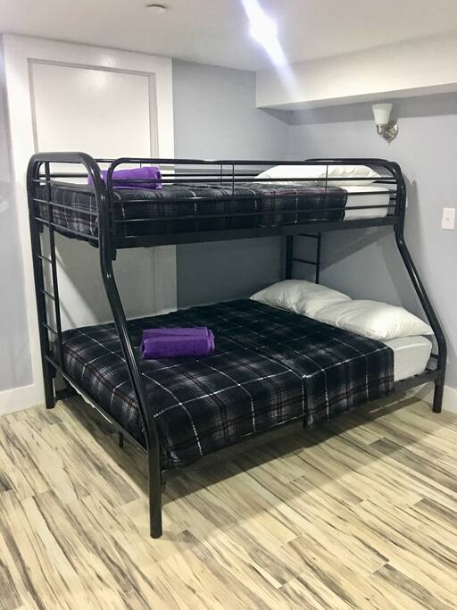 Bedroom with minifridge and smart TV