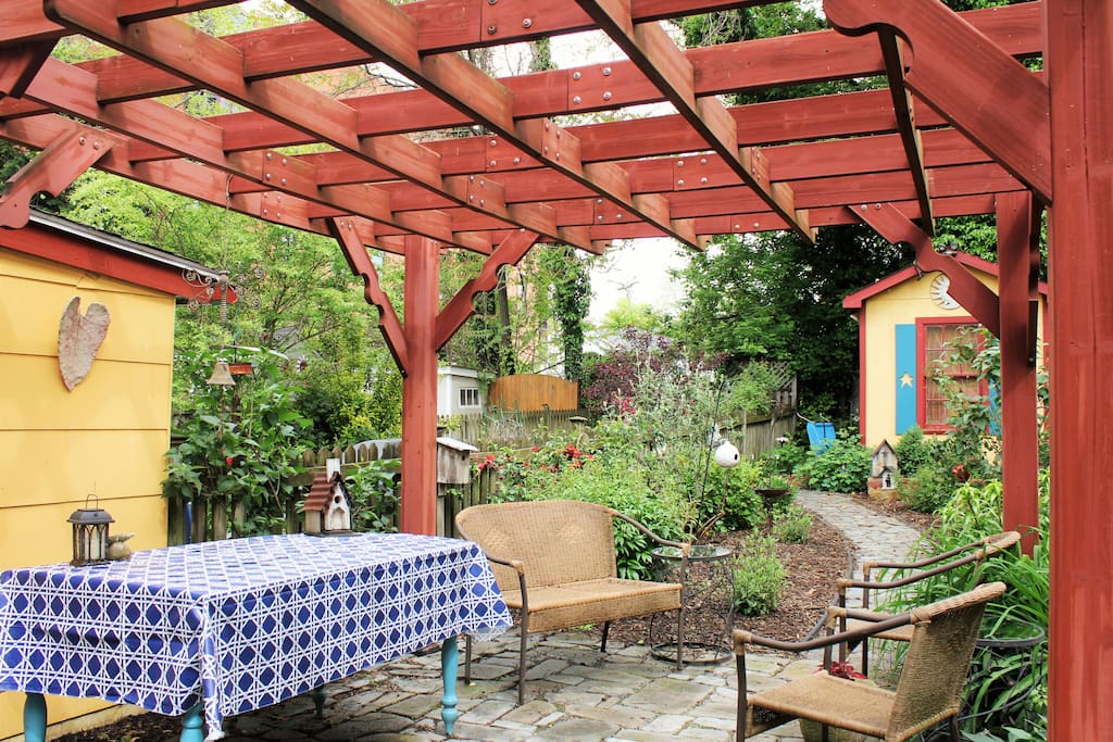 Quaint garden spot with patio seating.