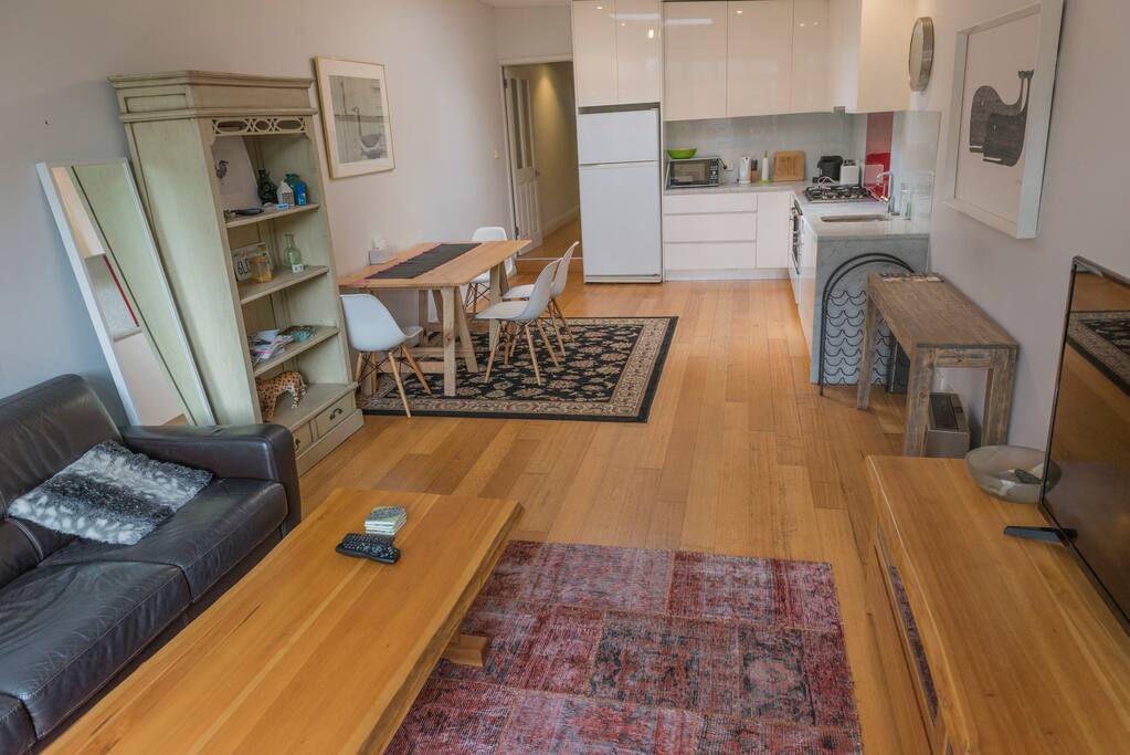 View from the living room with the kitchen and dining table.