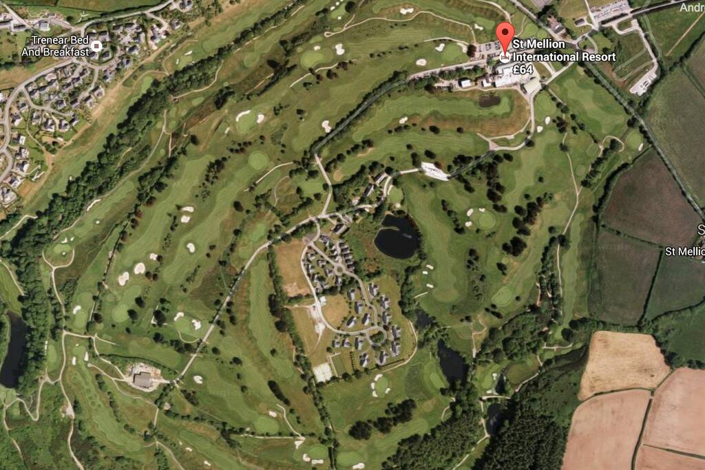 Set within two championship golf courses