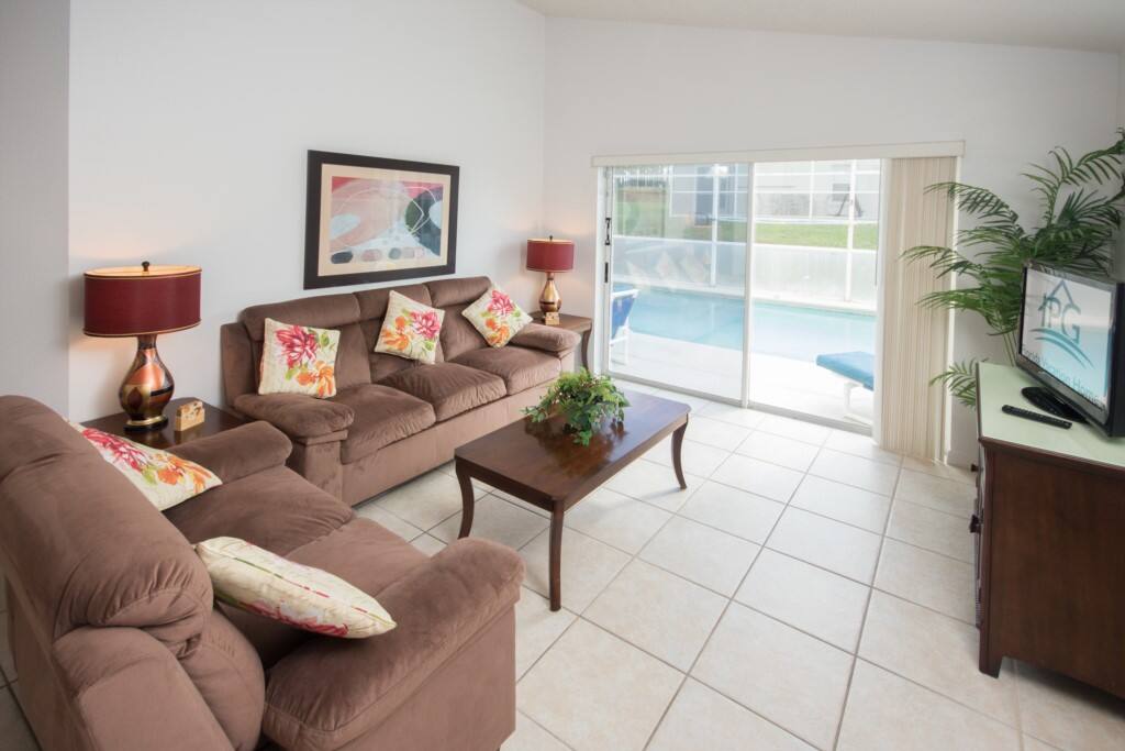 The Living Room,With Patio Doors to the Pool & a Flat Screen TV