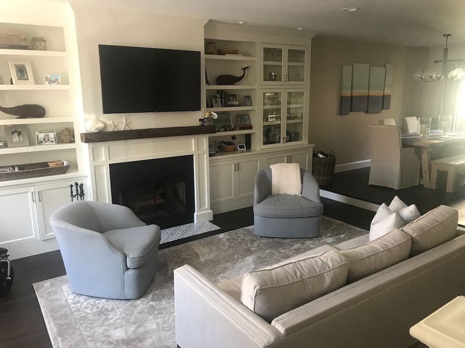 Walk in front door to open living and dining room. Working fireplace.