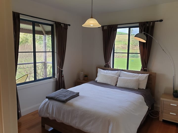 Master bedroom with Queen bed and build ins