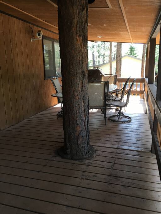 Large wood deck to enjoy your morning coffee and meals amongst the pines. BBQ grill and table seats 6