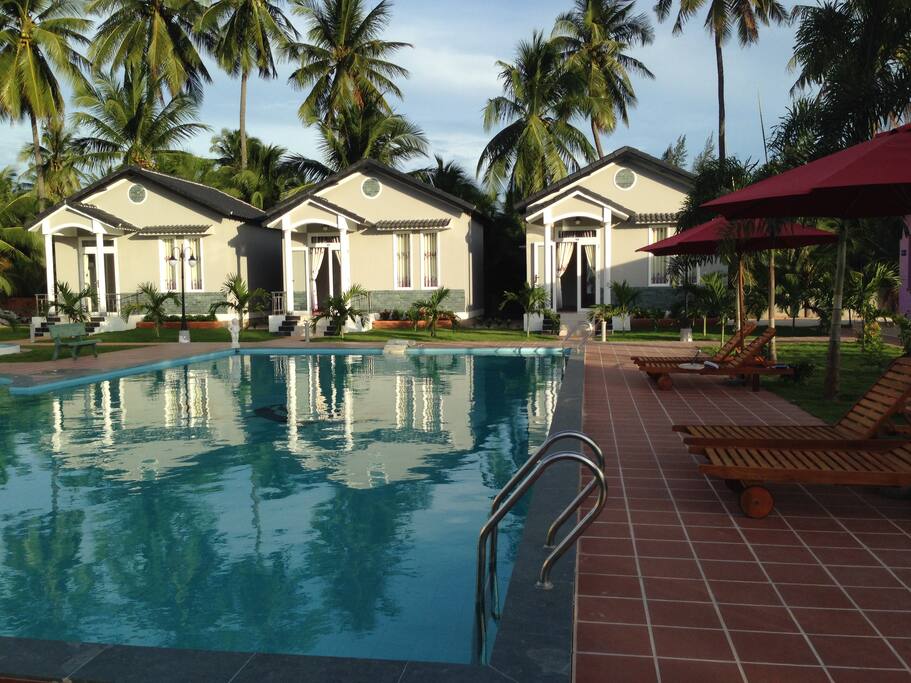 3 MORE DOUBLE BED BUNGALOWS LOOKING OUT THE SWIMMING POOL