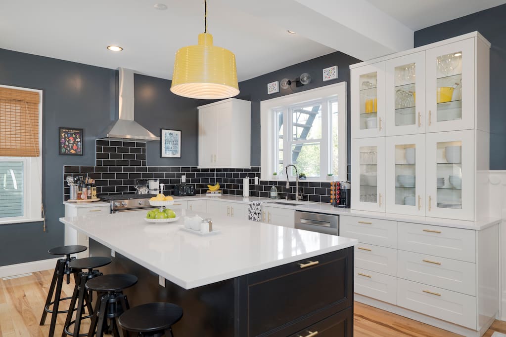 Kitchen with island that, combined with dining room table, seats 10 easily.