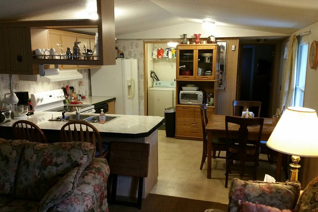 Living Room view into Kitchen and Dining Area