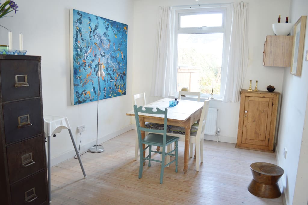 Dining area with six chairs available