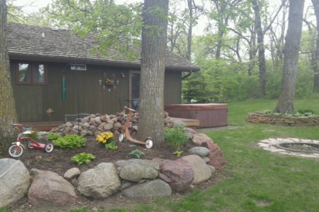 Fire pit is on the right and you can see the hot tub