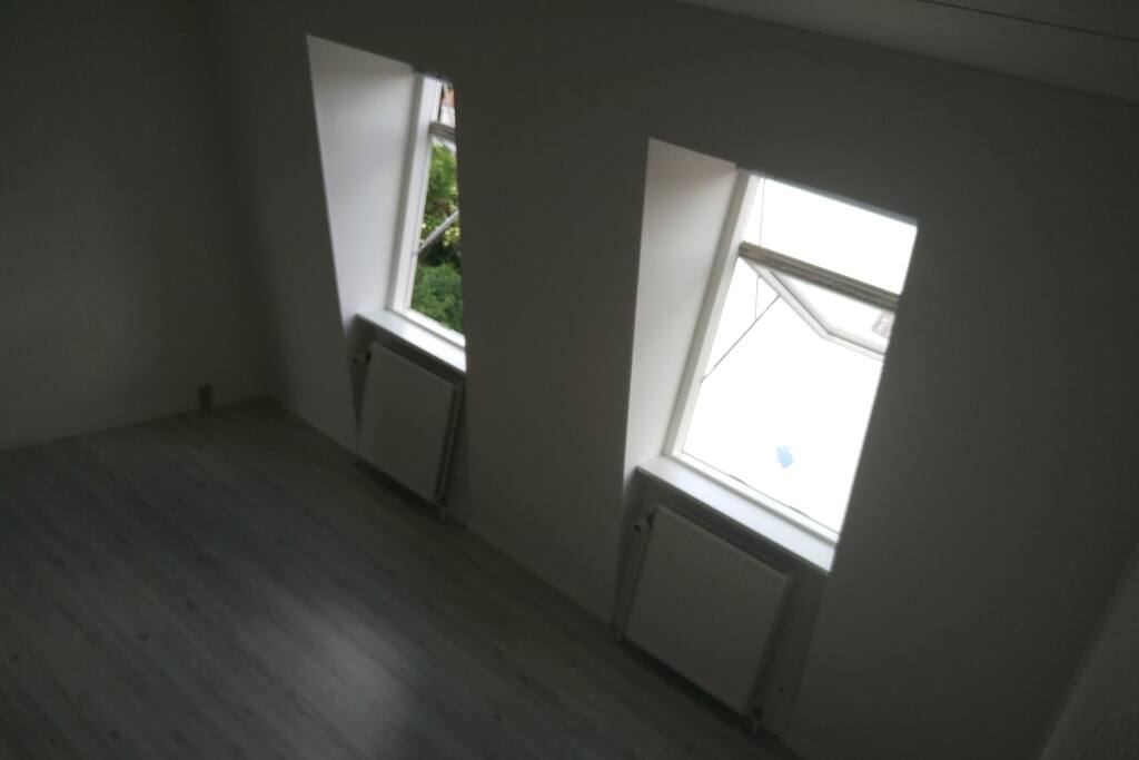 Two big windows which open fully to ensure a refreshing breeze during those hot Danish summer days.
