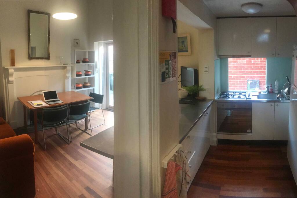 Living room with kitchen located downstairs