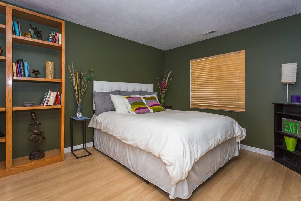 Cozy queen bedroom with tons of natural light.