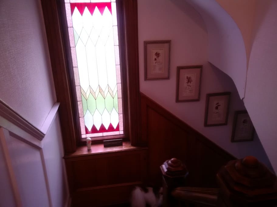 Four stain glass windows, three in the living room and this one on the landing.