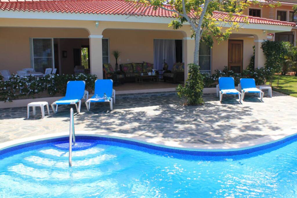 Large roofed terrace with comfortable sitting areas