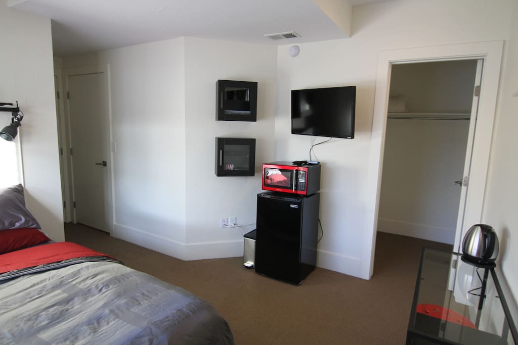 TV, mini-fridge, microwave, dishes and silverware provided