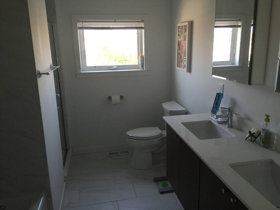 ensuite bathroom, bath, and (huge) shower.