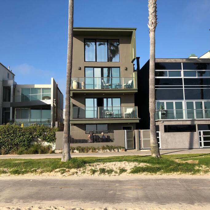 The whole house shot from the sand. Second floor balcony is yours!