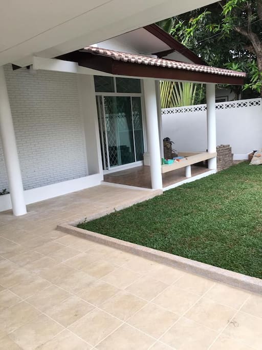 The parking space leading up to the lawn