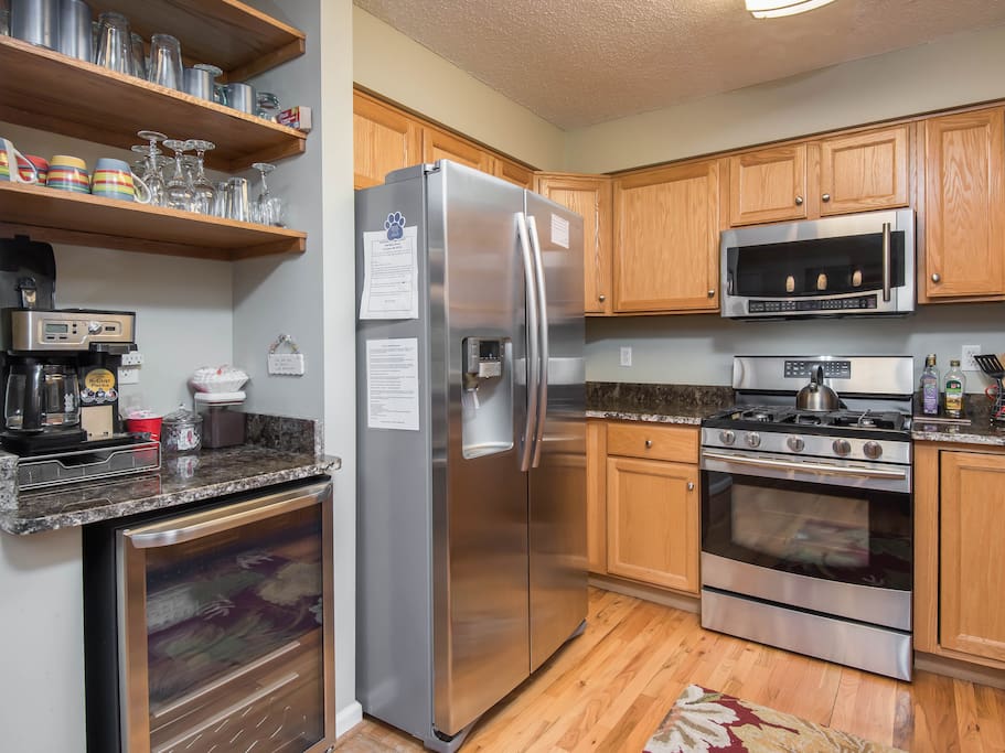 Kitchen with extra beverage fridge