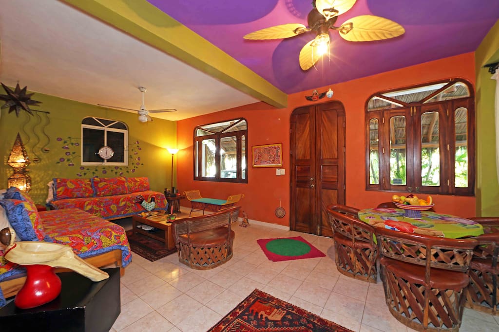 living room, dining area and front door