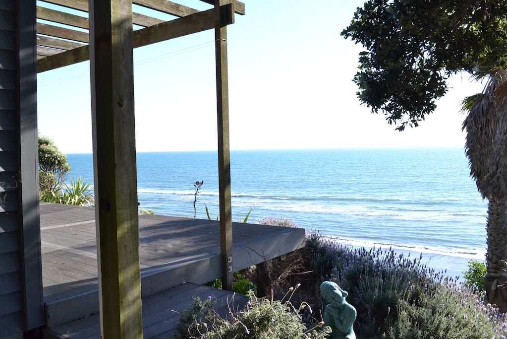 Bottom deck - photo from top of walkway to beach down side of property.