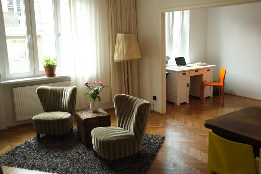 spacious living room, workspace and dining area