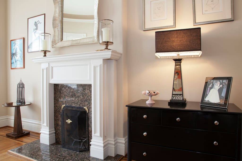 The parlor fireplace.