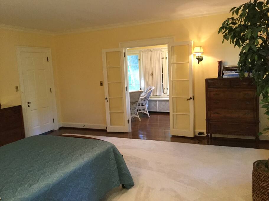French doors to office provide privacy.