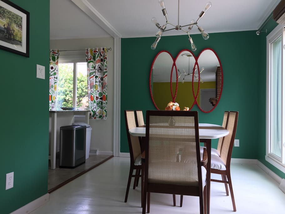 Retro dining table that comfortably sits 6 with an extra leaf to extend.