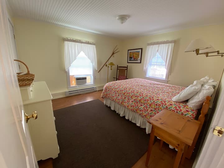 One bedroom with a queen size bed.  A window unit air conditioning for those hot summer days.