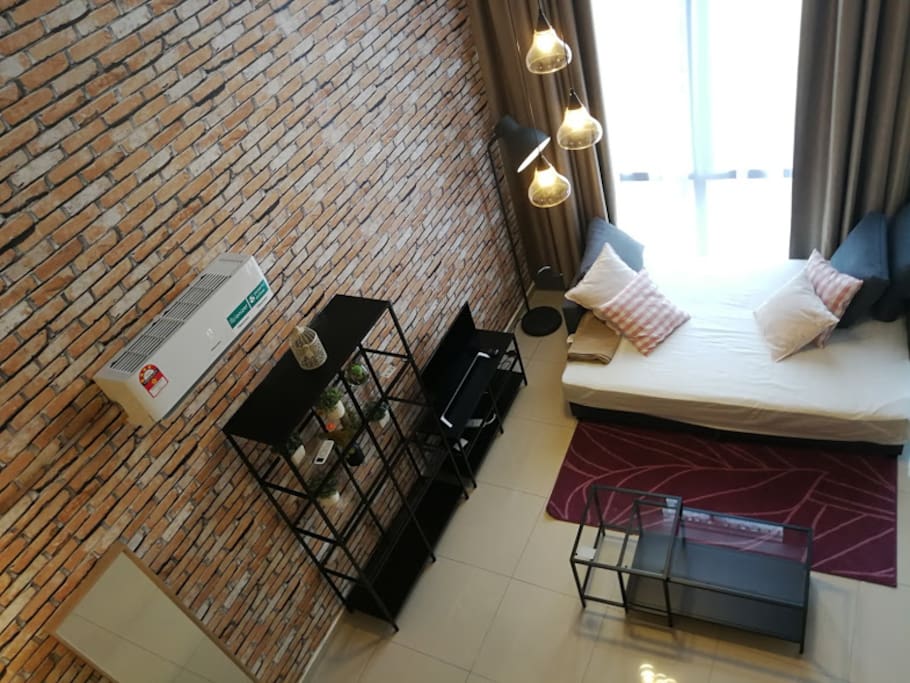 Sofa chair converted into a Queen Size bed. This room is able to fit 6 adults comfortably. As we prioritize your comfort, fresh linens are provided for guests utilizing the sofabed.
