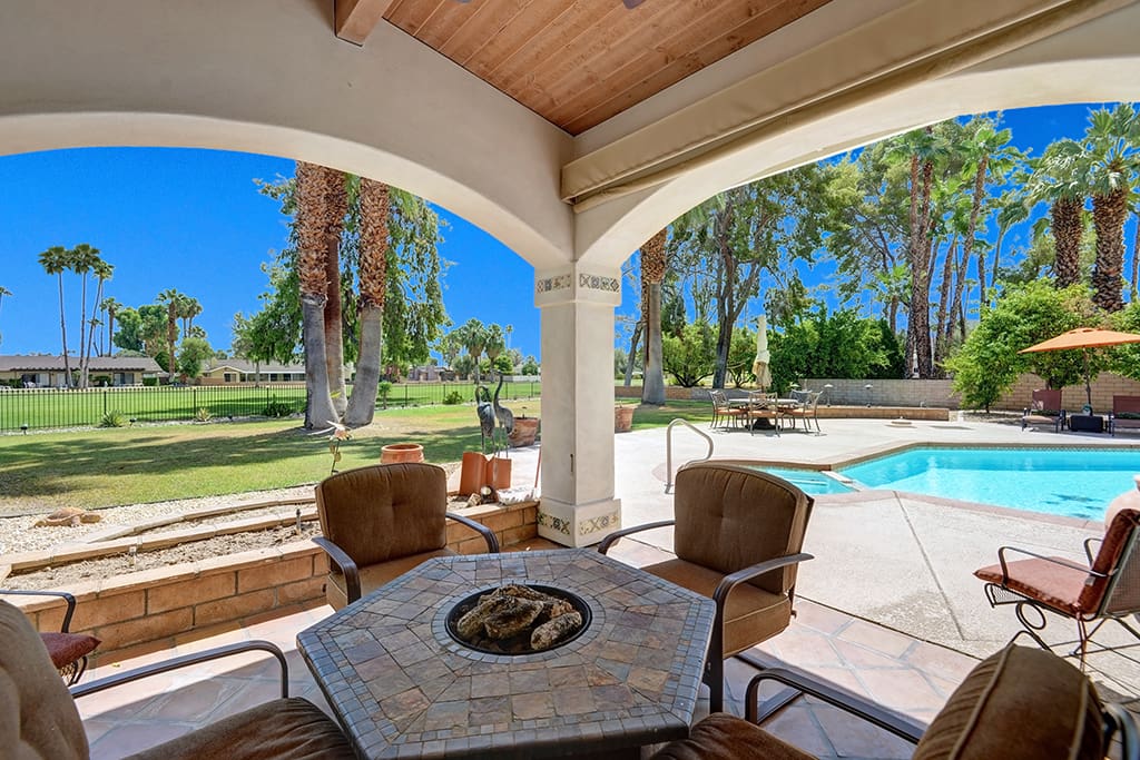 Chill by the Fire Pit - Oranj Palm Vacation Homes