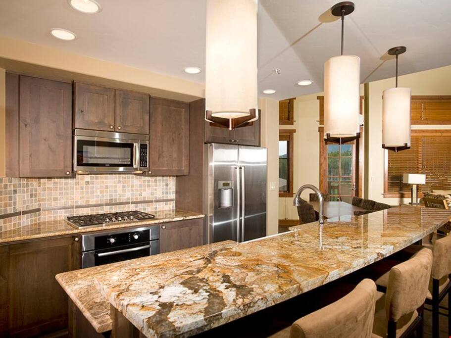 Enjoy cooking in the fully-equipped kitchen, complete with stainless steel appliances