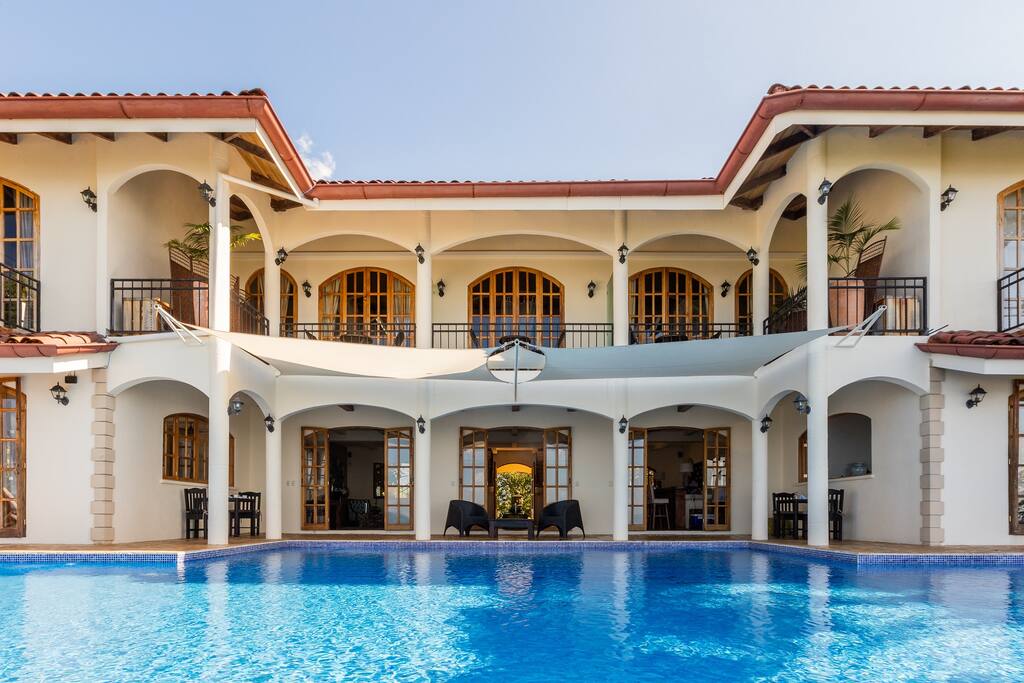 Front of hotel with infinity pool
