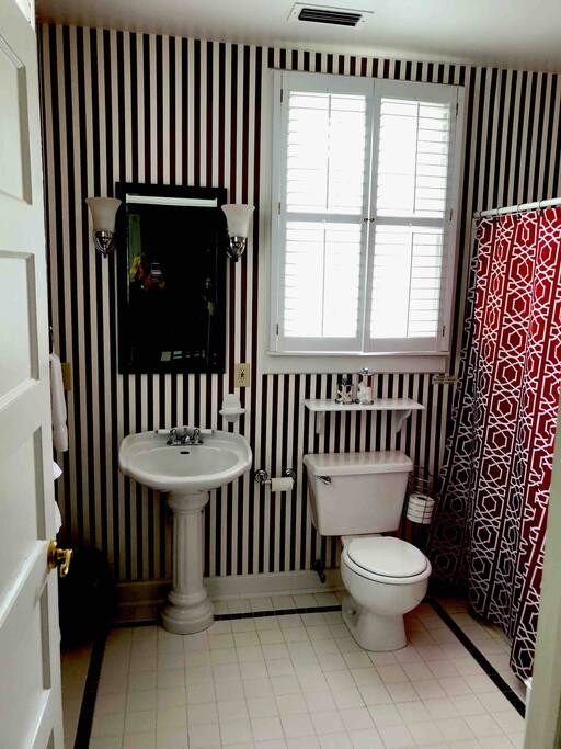 Enjoy a private bath with a shower/ tub combination including the wonderful rainfall shower heads in every room